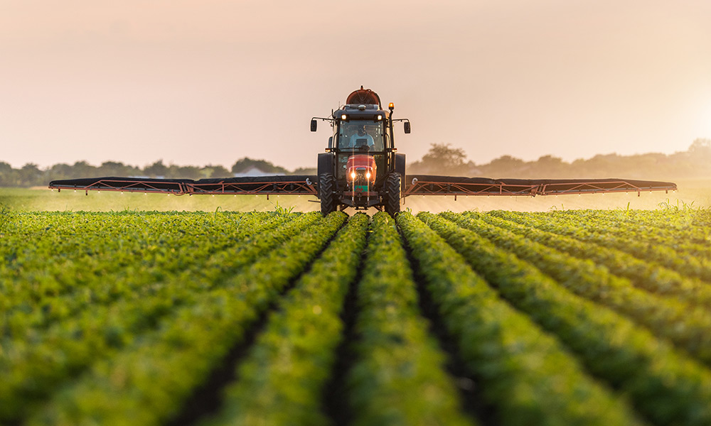 Crop spraying contractor applying a treatment to a field