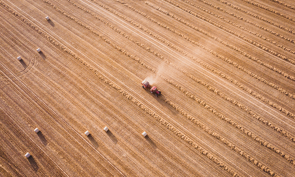 Farm machinery hire assisting farming services during harvest